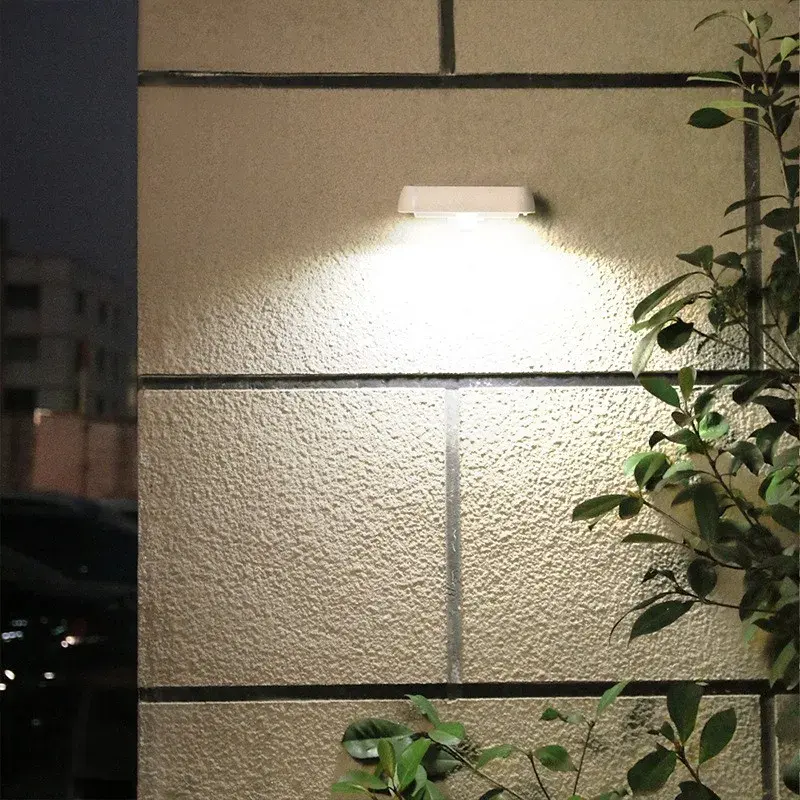Lampa solara LED dreptunghiulara pentru perete, 18 x 7 cm, senzor miscare, 6V, ABS, 2200mAh, rezistent la apa, culoare lumina alb rece, alb
