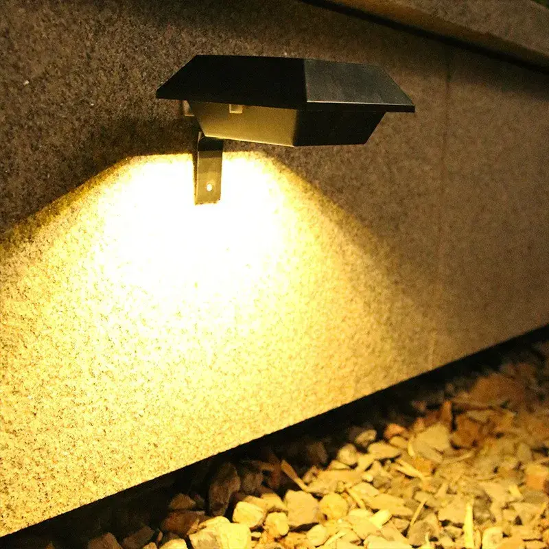 Lampa solara LED pentru gradina/scari/balustrade, 3.7V, ABS, 1200mAh, 12 x 6 cm, 12 LED-uri SMD, lumina alb cald, carcasa neagra